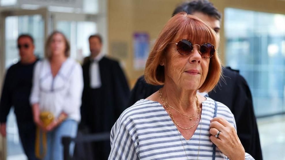 Gisèle Pelicot who has allegedly been drugged and raped by men solicited by her husband Dominique Pelicot, followed by her lawyer Stephane Babonneau, walks at the courthouse in Avignon, France, September 10, 2024