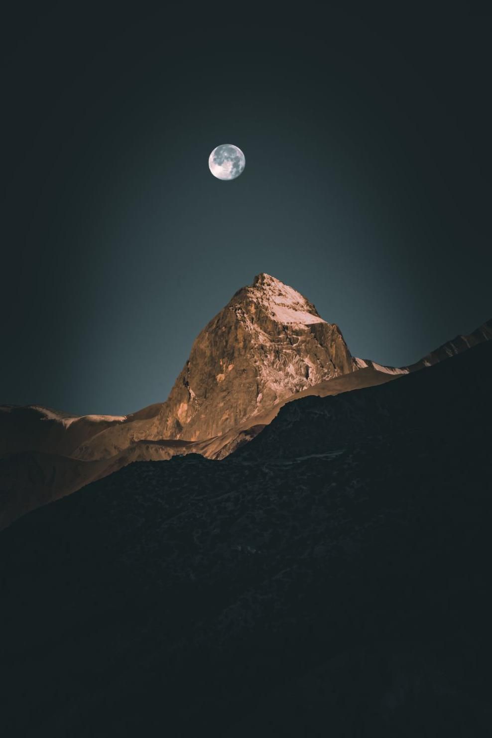 The moon over a mountain
