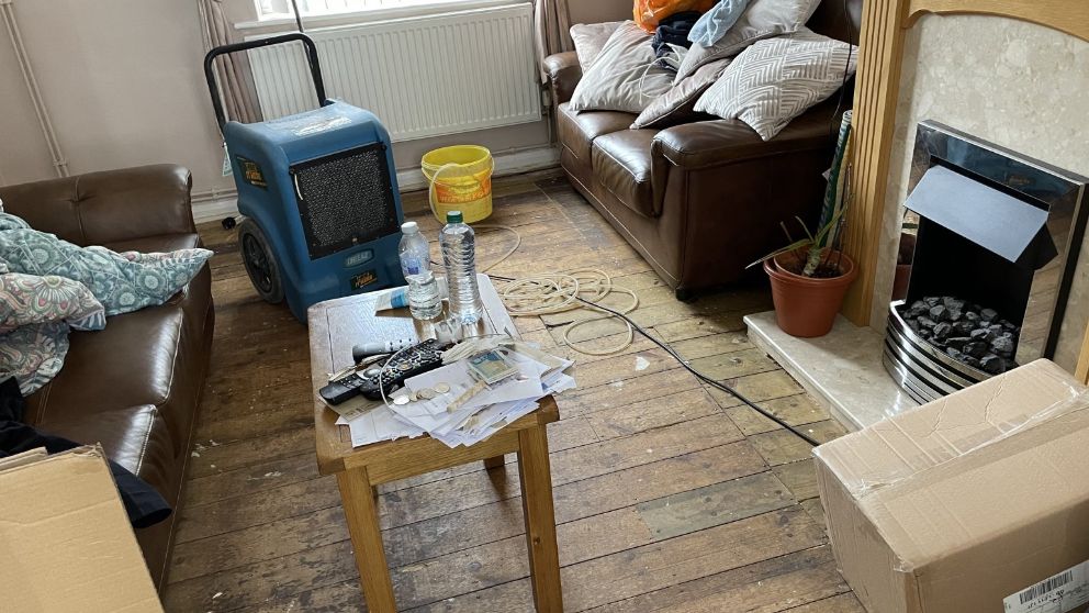 Living room affected by flooding
