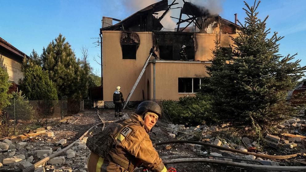 Firefighters work at a site of a Russian missile strike, amid Russia's attack on Ukraine, in Kharkiv, Ukraine May 10, 2024