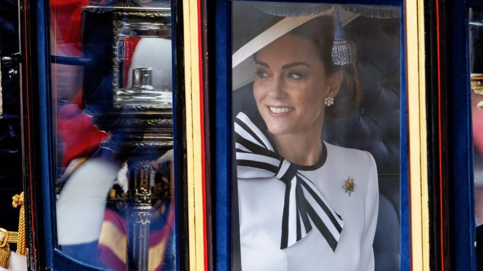 ritain's Catherine Princess of Wales looks on as she travels from Buckingham Palace to Horse Guards Parade inside a carriage during the Trooping the Colour parade in London, Britain, 15 June 2024. 