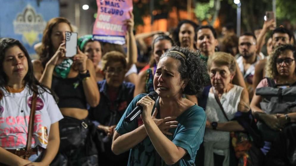 Women participate in a protest against the 1904 bill, a proposed law which restricts legal abortion in cases of rape and equates the procedure to simple homicide, in Cinelandia, Rio de Janeiro, Brazil, 13 June 2024.