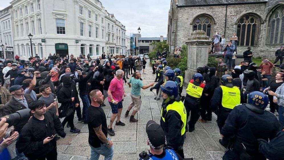 Police clash with protesters in Plymouth