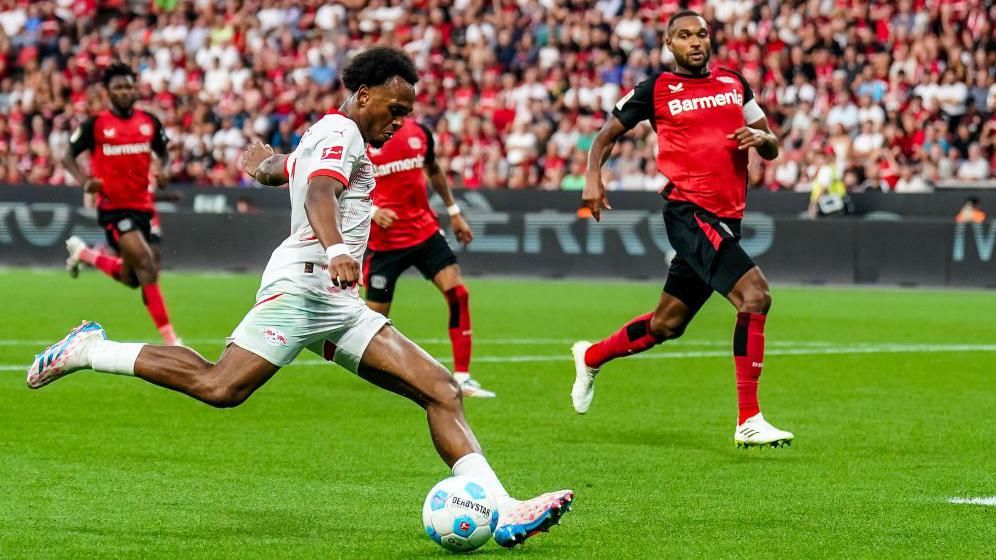 Lois Openda scores to bring RB Leipzig level during their Bundesliga victory over champions Bayer Leverkusen at the BayArena