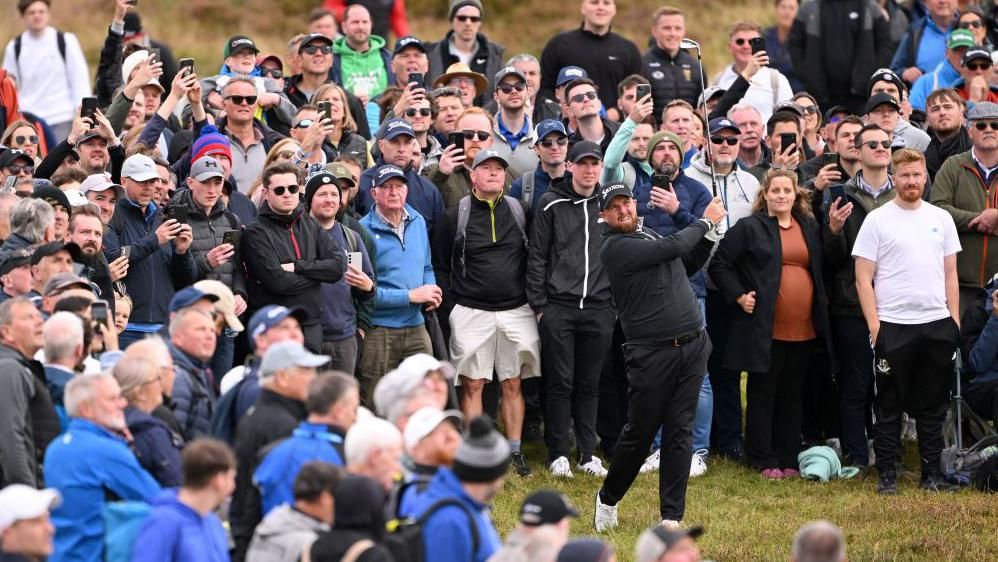 Shane Lowry hits a shot from the rough during the second round