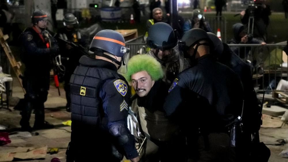 Police officers arrest a person at the encampment of pro-Palestinian protestors on the campus of University of California Los Angeles (UCLA) in Los Angeles, California, USA, 02 May 2024
