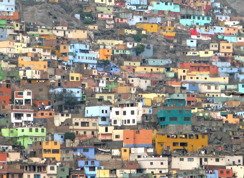 Multi-coloured houses on a crowded hillside