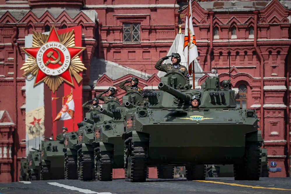 Russian BMD-4 amphibious infantry fighting vehicles roll through the Red Square