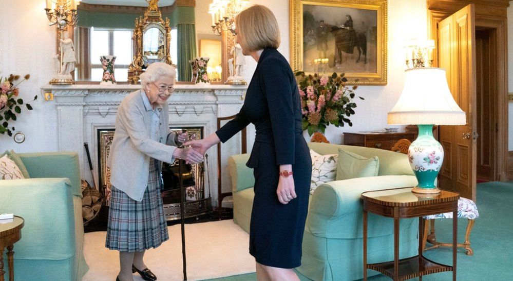 Liz Truss greets the Queen