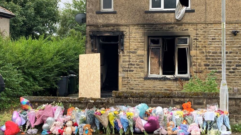 Tributes at the scene of the fire