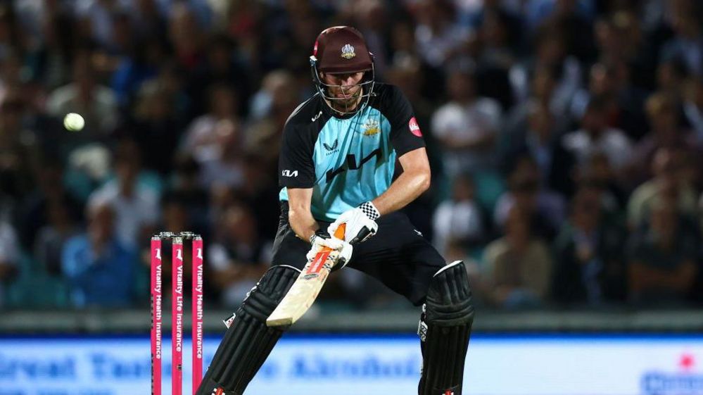 Dom Sibley attempts a scoop in Surrey's T20 quarter-final win over Durham at The Oval 