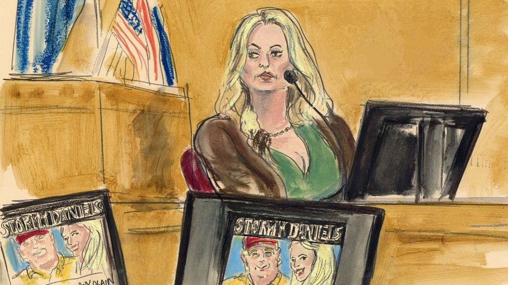Sketch of adult-film star Stormy Daniels on witness stand
