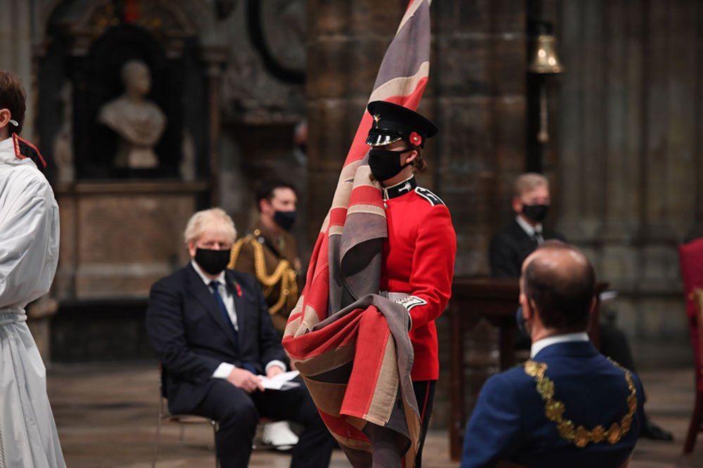 A flag bearer during a special service at Westminster Abbey