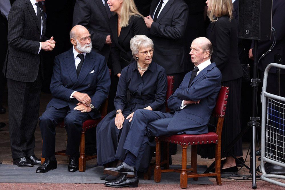 Prince Michael of Kent, Birgitte, Duchess of Gloucester, and Prince Edward, Duke of Kent, sit together as the Principal Proclamation is read from the balcony