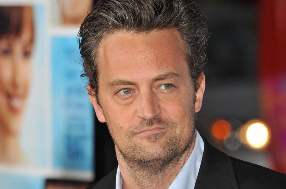 Matthew Perry headshot as he looks away from the camera