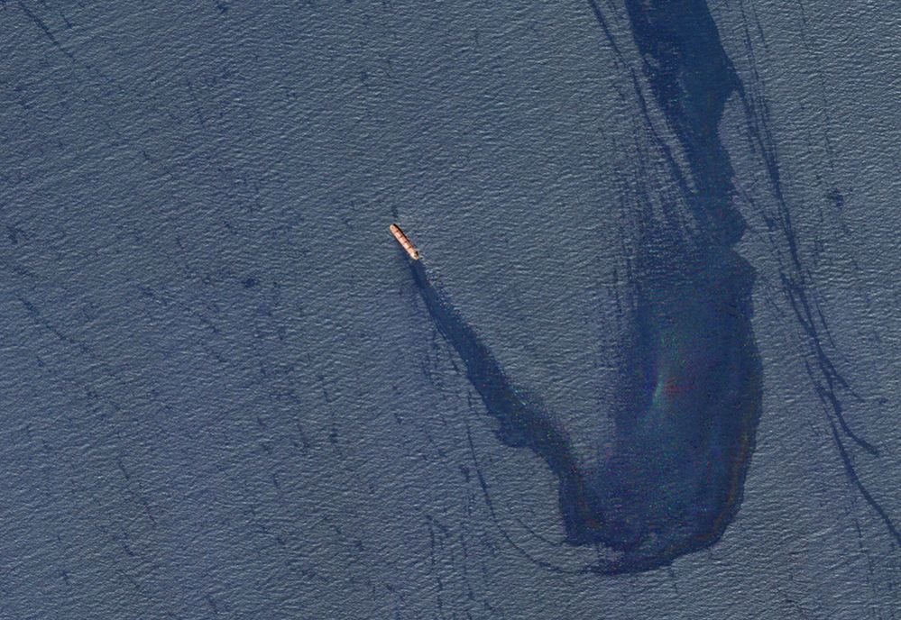 A satellite image showing the ship still above water