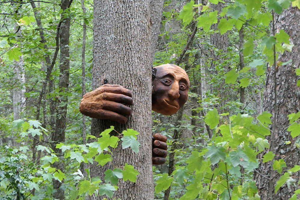 Sculpture of Gollum in the trees