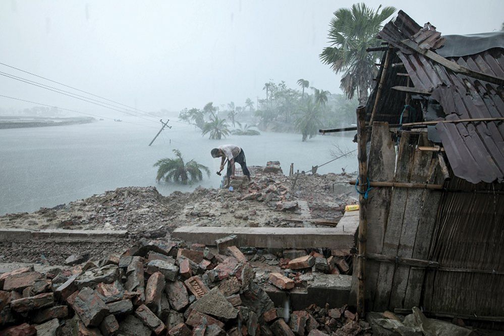 A man salvaging his possessions