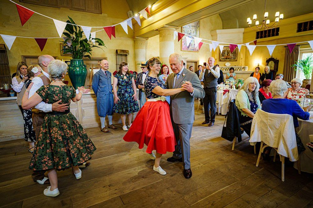 The then Prince of Wales (now King Charles III) dances with Bridget Tibbs during a Jubilee tea dance hosted by The Prince's Foundation to mark the Platinum Jubilee, at Highgrove near Tetbury, Gloucestershire, 31 May 2022