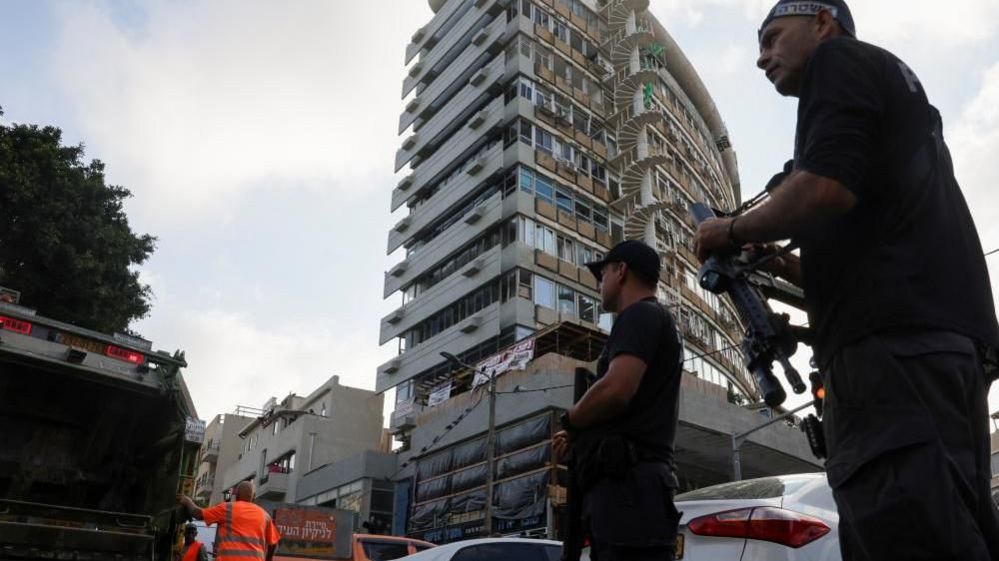 Police at the site of a drone strike in Tel Aviv.