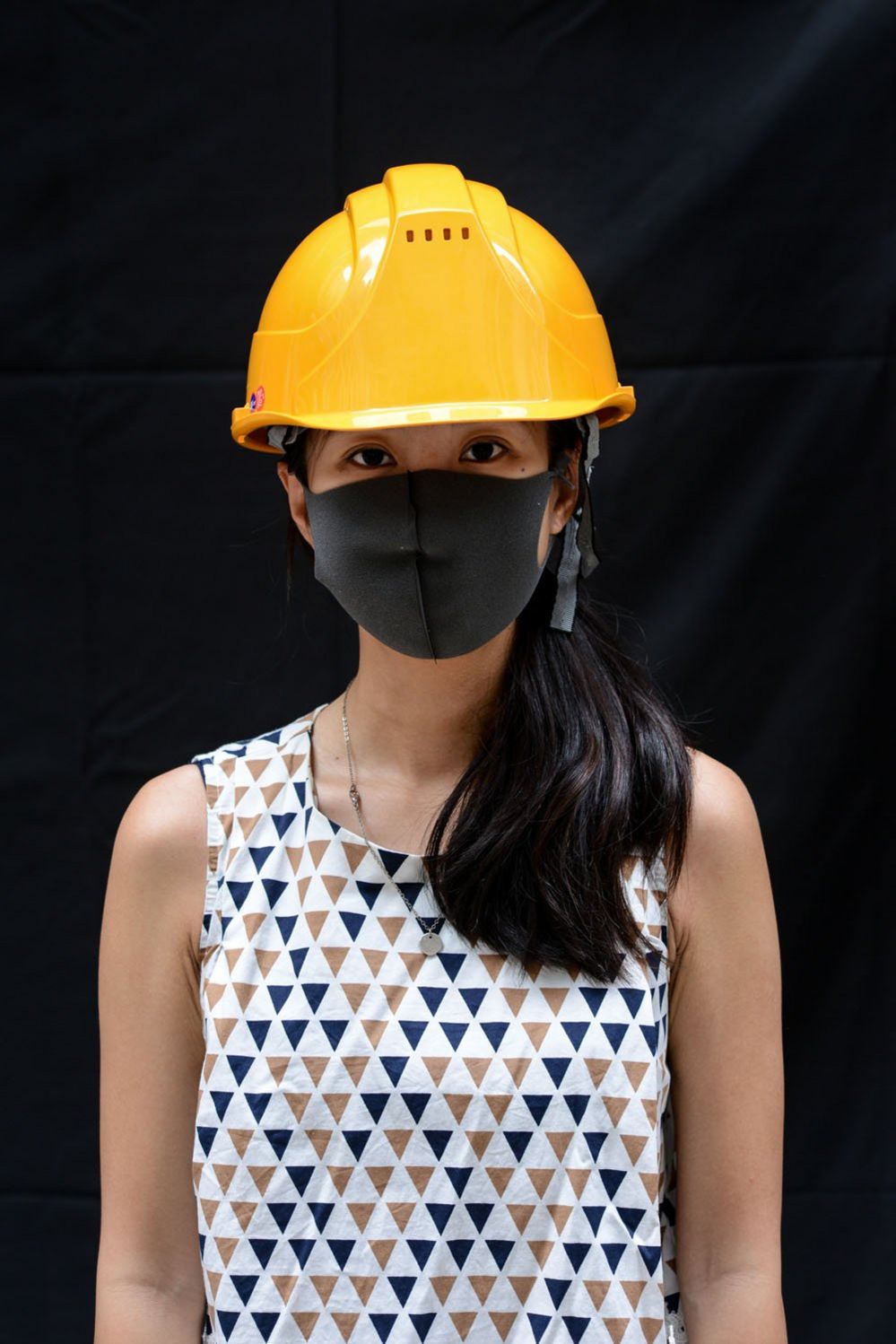 A protester poses for a portrait during the Anti-Totalitarianism march in Causeway Bay, Hong Kong, 29 September 2019