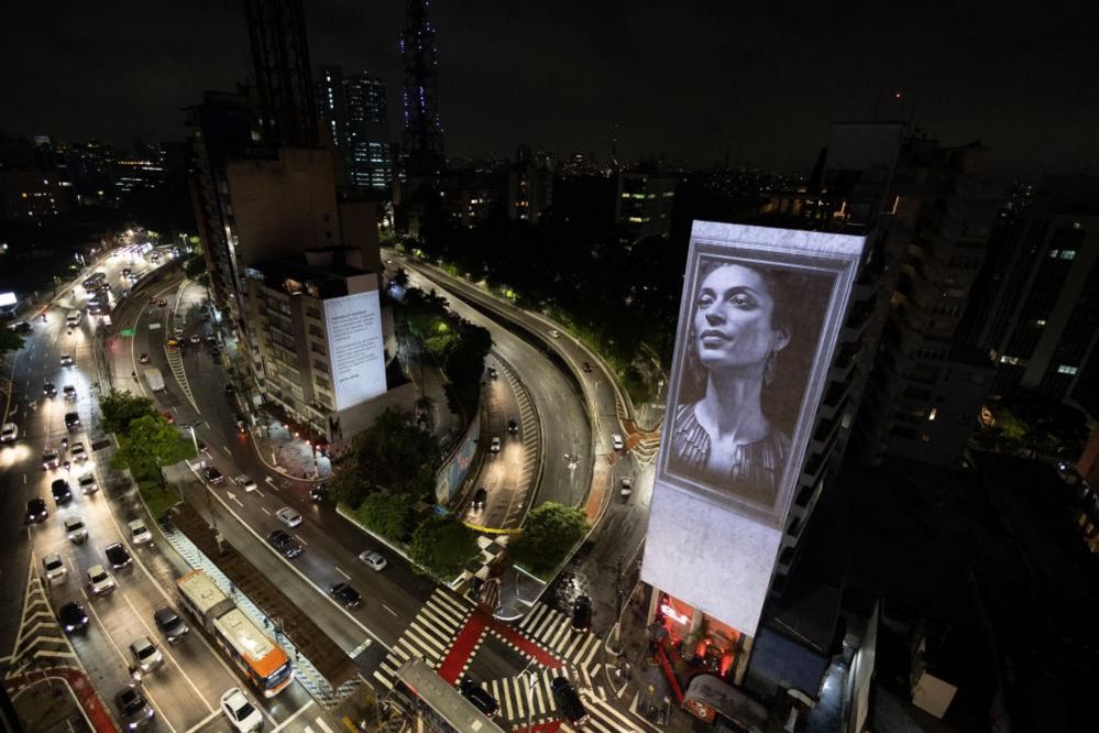Marielle Franco's photo projected onto a building, Sao Paulo, Brazil