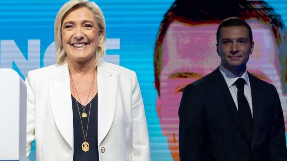 National Rally parliamentary party leader Marine Le Pen (L), standing next to leader Jordan Bardella (R), smiles after delivering a speech at the electoral party of the French right-wing party National Rally (Rassemblement National or RN) in Paris, France, 09 June 2024