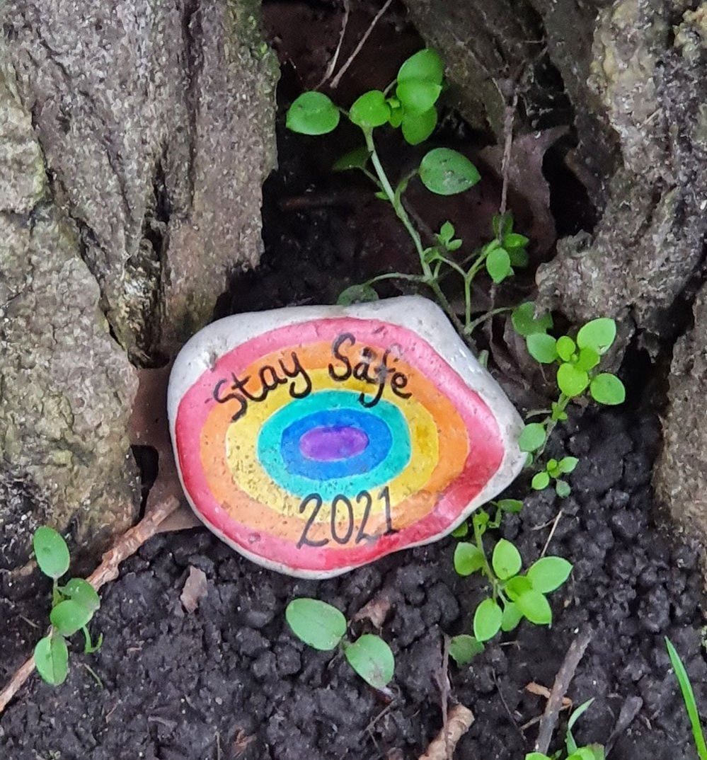 "Stay safe" painted on a rock