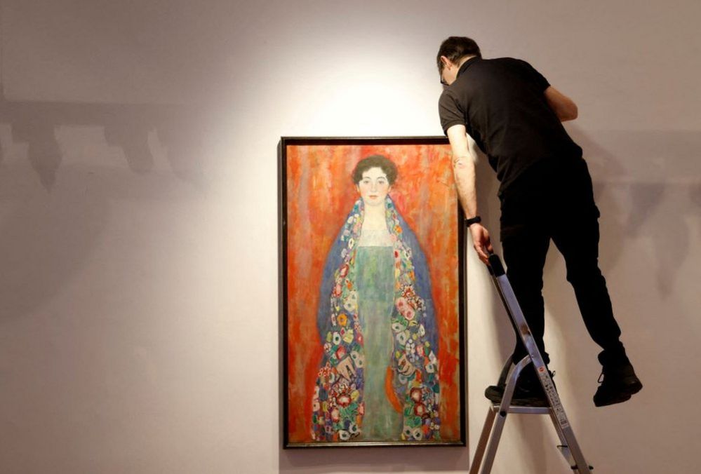 A worker adjusts Austrian painter Gustav Klimt's Portrait of Fraulein Lieser