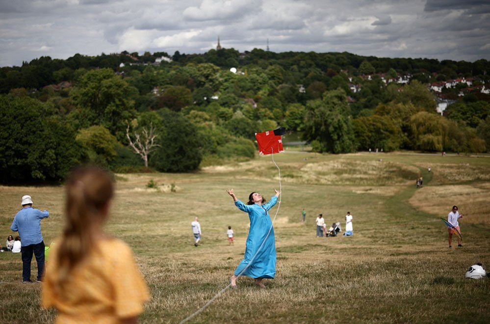 A woman flying a kite
