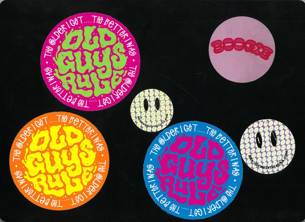 Four stickers with the words 'old guys rule' on them and two smiley face stickers