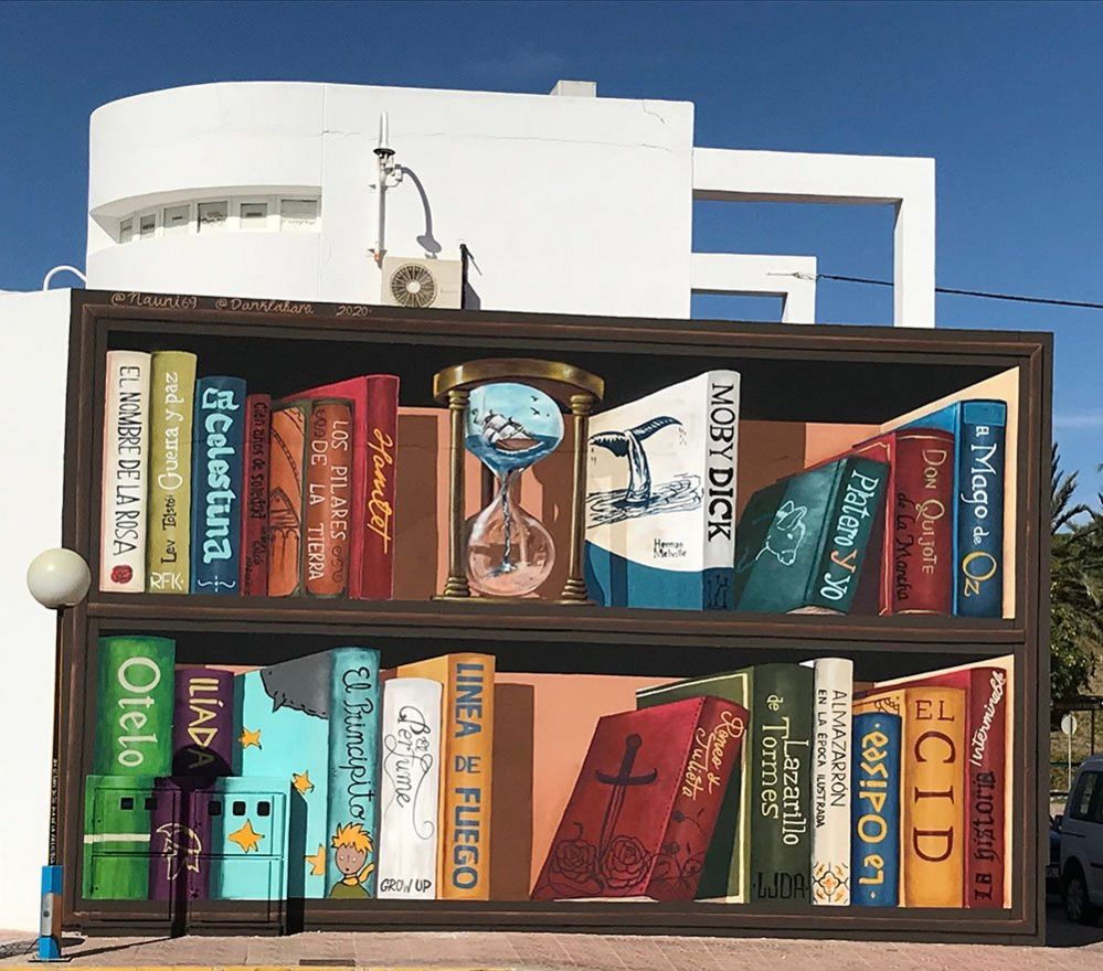 A building painted to look like a bookshelf