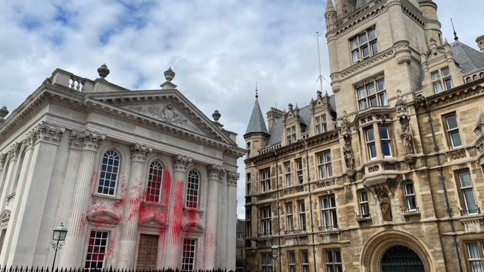 Red paint on Senate House in Cambridge