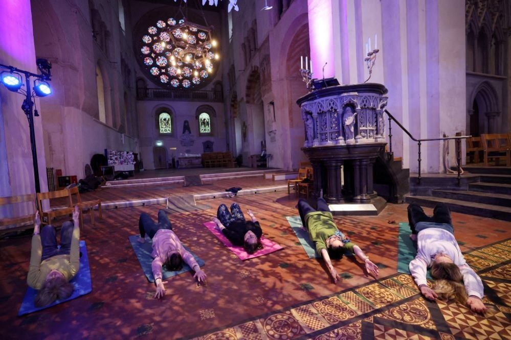 A yoga class in St Albans Cathedral