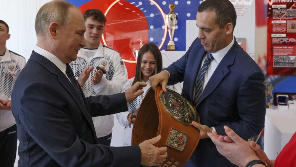 Kremlev is pictured here with Russian President Vladimir Putin at the country's newly opened International Boxing centre in September 2022