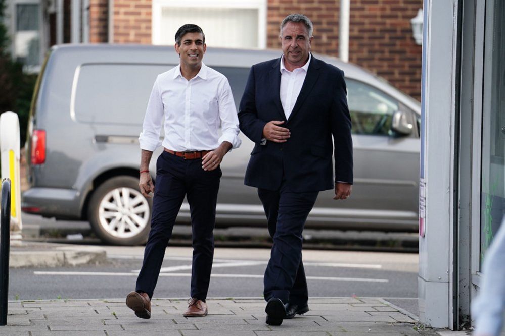 Prime Minister Rishi Sunak and newly elected Conservative MP Steve Tuckwell arriving at the Rumbling Tum cafe in Uxbridge, west London
