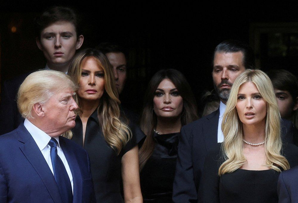 Former US President Donald Trump, his wife Melania, Kimberly Guilfoyle, his sons Barron and Donald Jr. and his daughter Ivanka leave St Vincent Ferrer Church during the funeral of Ivana Trump