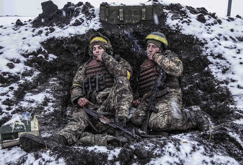 Ukrainian soldiers in their foxhole