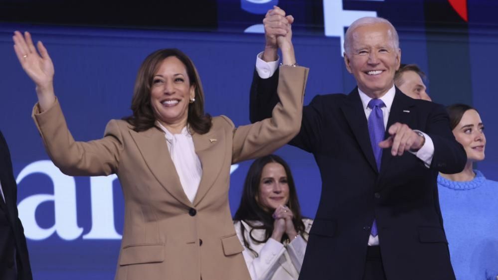 Kamala Harris and Joe Biden stand together after the president gave a speech at the Democratic National Convention on Monday. 