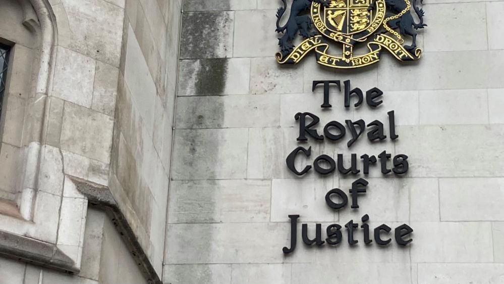 Sign saying Royal Courts of Justice