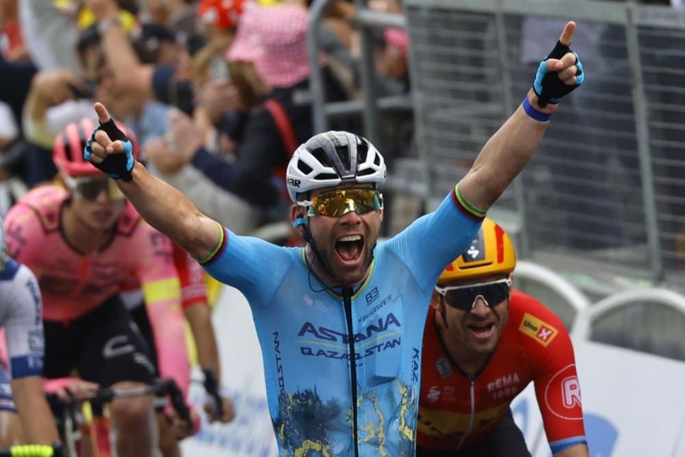 British cyclist Mark Cavendish seen raising his arms in the air after winning the fifth stage of Tour de France 2024