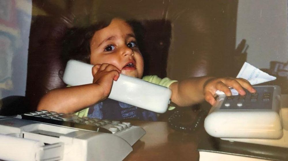 Child speaking on phone