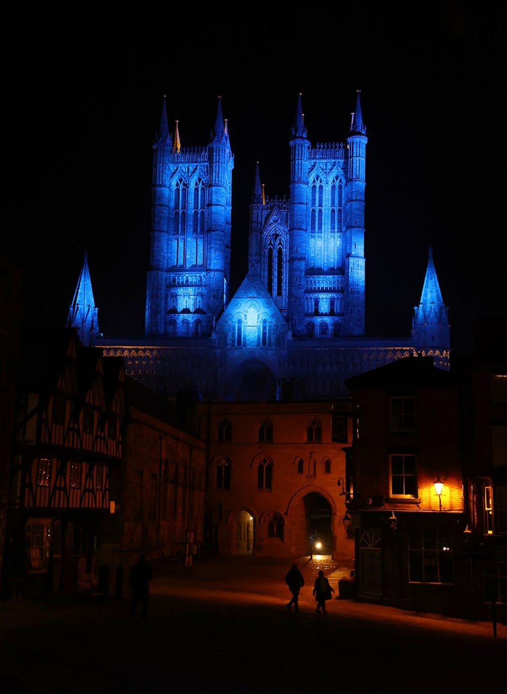 Lincoln Cathedral lit up in blue