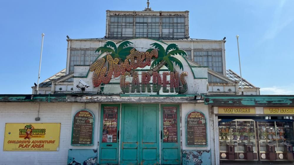 The front entrance of the Winter Gardens and illuminated signage