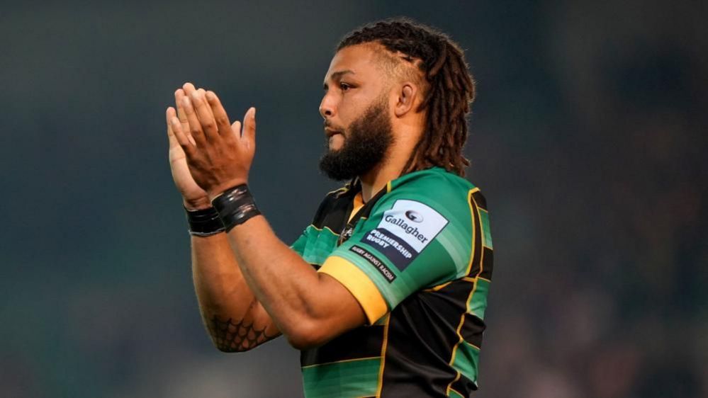 Lewis Ludlam with dark hair and beard during a Saints game