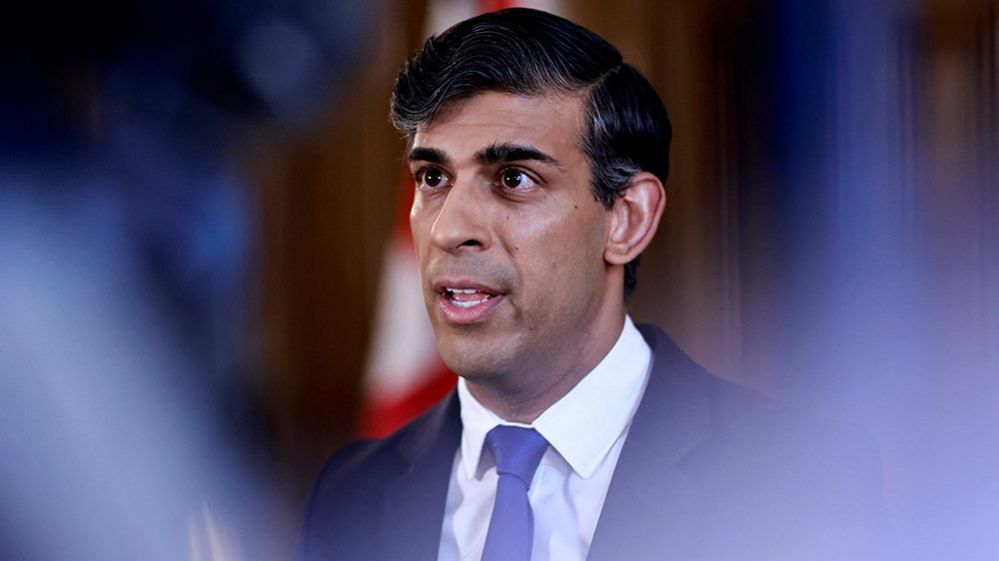 Rishi Sunak speaking inside Downing Street in London on 14 April