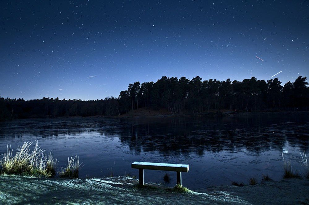 A frozen lake in the early hours of a winter morning, Hampshire