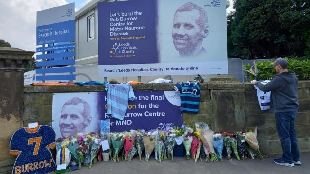 Tributes to Rob Burrow outside Seacroft Hospital in Leeds