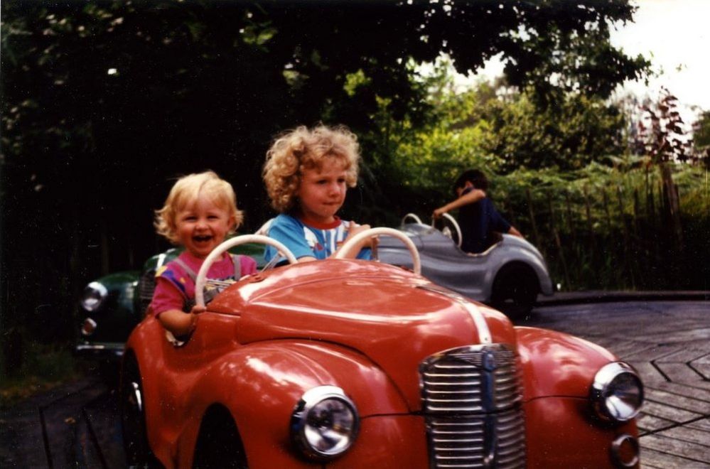 Two girls in a car on a fairground ride