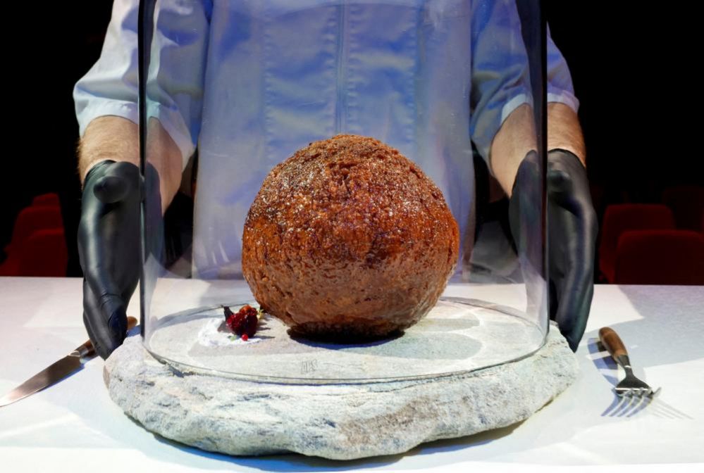 A meatball made from flesh cultivated using the DNA of an extinct woolly mammoth